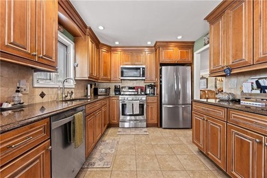 Welcome to 4711 Hylan Boulevard, a beautiful detached - photo 11