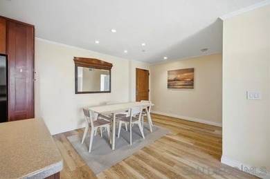 This top-floor sun-filled condo located in the center of the - photo 11