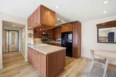 This top-floor sun-filled condo located in the center of the - photo 12