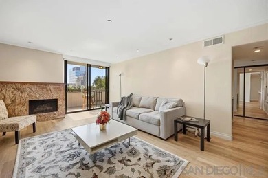 This top-floor sun-filled condo located in the center of the - photo 18