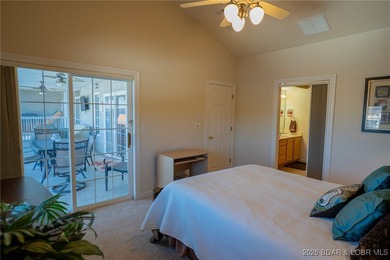 Elevate your Lake lifestyle in this premier Top Floor residence