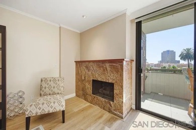 This top-floor sun-filled condo located in the center of the - photo 20