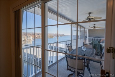 Elevate your Lake lifestyle in this premier Top Floor residence