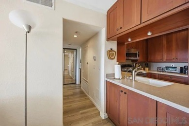 This top-floor sun-filled condo located in the center of the - photo 24