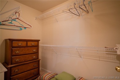 Elevate your Lake lifestyle in this premier Top Floor residence