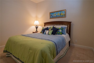 Elevate your Lake lifestyle in this premier Top Floor residence