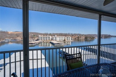 Elevate your Lake lifestyle in this premier Top Floor residence