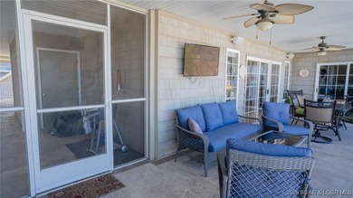 Elevate your Lake lifestyle in this premier Top Floor residence