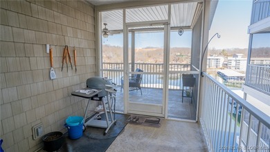 Elevate your Lake lifestyle in this premier Top Floor residence