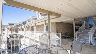 Elevate your Lake lifestyle in this premier Top Floor residence