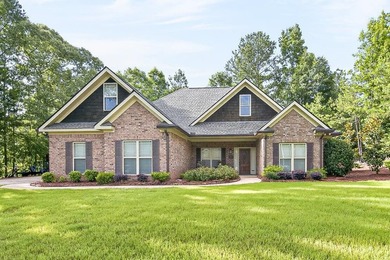 Welcome to 144 Mustang Trail in the desirable Ellerslie Place - photo 1