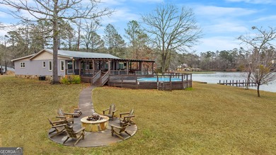 SUNSETS AND VIEWS FOR DAYS! This stunning fee simple lake home - photo 19