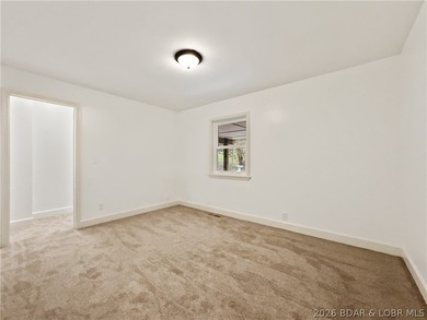 EXTREMELY MOTIVATED SELLER. Nearly flat lakefront yard, acreage - photo 25