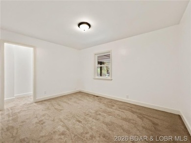 EXTREMELY MOTIVATED SELLER. Nearly flat lakefront yard, acreage - photo 25