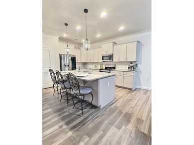 Timeless, beautifully maintained home located in the highly