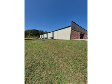 This well-maintained commercial building was formerly leased to - photo 4