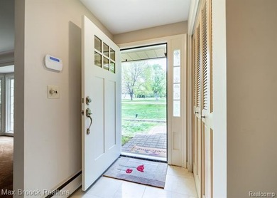 Nestled on a picturesque .71-acre parcel with serene pond - photo 4