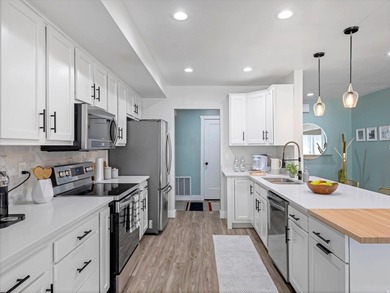 Come see this one of a kind condo in the Forest Glen community!