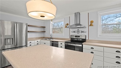 Welcome to this spacious 5-bedroom, 2-bath home in the Malibu - photo 14