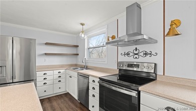 Welcome to this spacious 5-bedroom, 2-bath home in the Malibu - photo 21