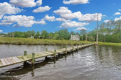 Waterfront homesite with extensive dock frontage in the gated - photo 24