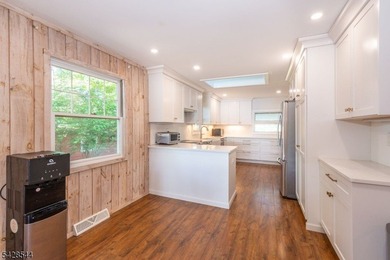 Welcome to your perfect lakefront RANCH retreat! This charming - photo 10