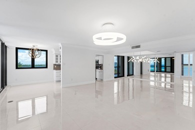 Discover the pinnacle of coastal living in this stunning - photo 3
