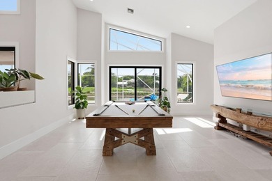 Exquisitely renovated 4BR/4BA lakefront estate in the desirable - photo 49