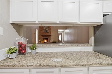 Welcome to this charming townhome located in the highly - photo 13