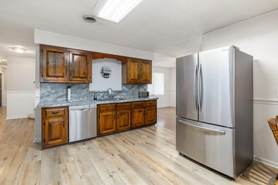 Enjoy country living on this 10-acre property with two homes - photo 13