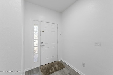 Wake up to tranquil pond views in this fully renovated 2023 - photo 4