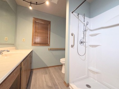 Accessible, zero-entry, open-concept townhouse situated on a - photo 15