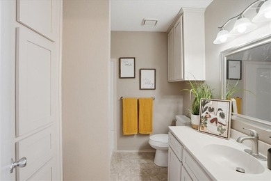 Welcome to this charming townhome located in the highly - photo 22