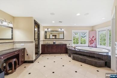 Nestled on a private nearly 1-acre cul-de-sac lot atop - photo 22