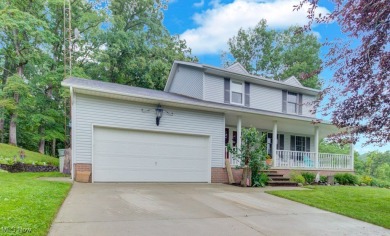 Welcome to this beautifully updated home nestled on a serene - Lake Home For Sale in Malvern, Ohio