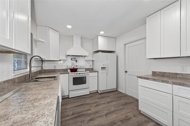 TOTALLY RENOVATED! NEW metal roof. NEW custom kitchen. NEW AC - photo 13