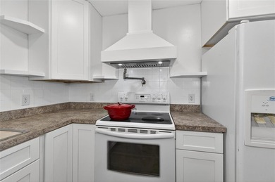 TOTALLY RENOVATED! NEW metal roof. NEW custom kitchen. NEW AC - photo 16