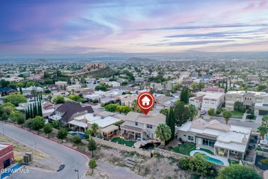 Set against the mountainside in prestigious Ridgeview Estates