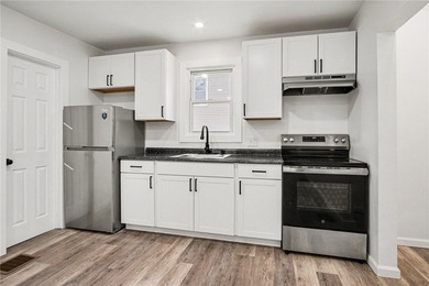 Turnkey investment opportunity or ideal owner-occupied duplex! - photo 11