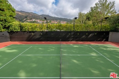 Set on more than half an acre behind the safe, secure, and - photo 37