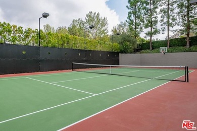 Set on more than half an acre behind the safe, secure, and - photo 39