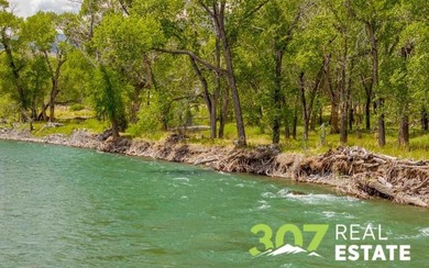Set along the South Fork of the Shoshone River, this exceptional - photo 8