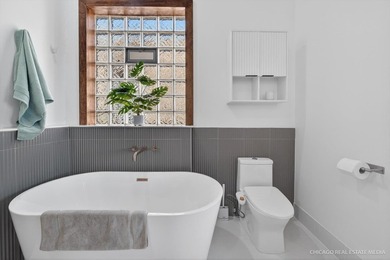 Discover an enviable retreat with sweeping skyline views in this - photo 22