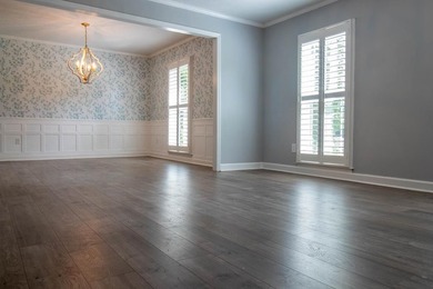 Price Adjustment! Welcome to this thoughtfully renovated - photo 3