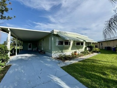 Welcome to this charming three-bedroom, two-bathroom mobile home - photo 23