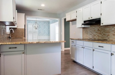 Price Adjustment! Welcome to this thoughtfully renovated - photo 7