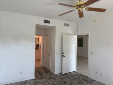 You'll love this FIRST FLOOR CONDO in the beautiful gated