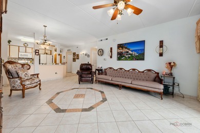 Step into this beautifully maintained, Tuscan-inspired residence