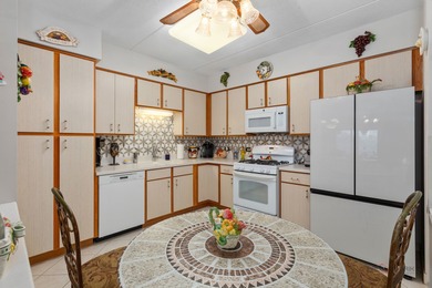 Step into this beautifully maintained, Tuscan-inspired residence