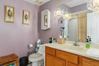 Step into this beautifully maintained, Tuscan-inspired residence